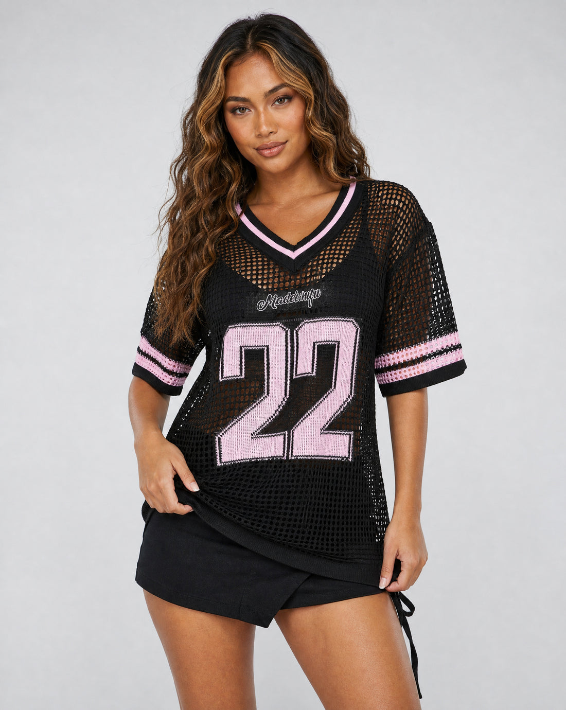 Zwart Gebreide Jersey met Roze Cijferprint en Korte Mouwen