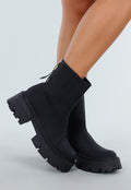 Zwarte Enkellaarsjes met Chunky Zool en Ritsdetail