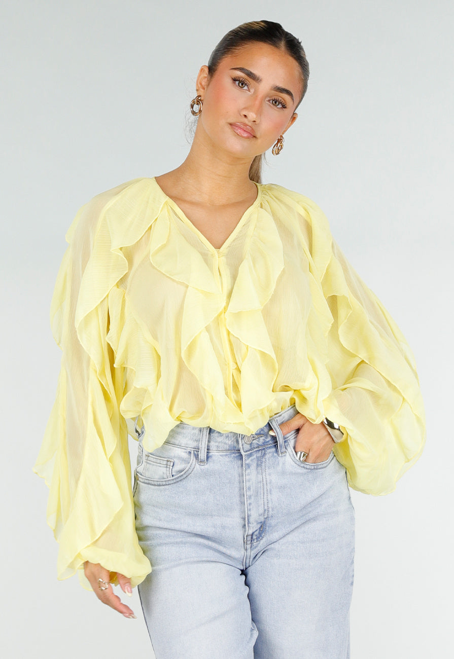 Gele Chiffon Blouse met Ruffles Lange Mouwen en Knopen