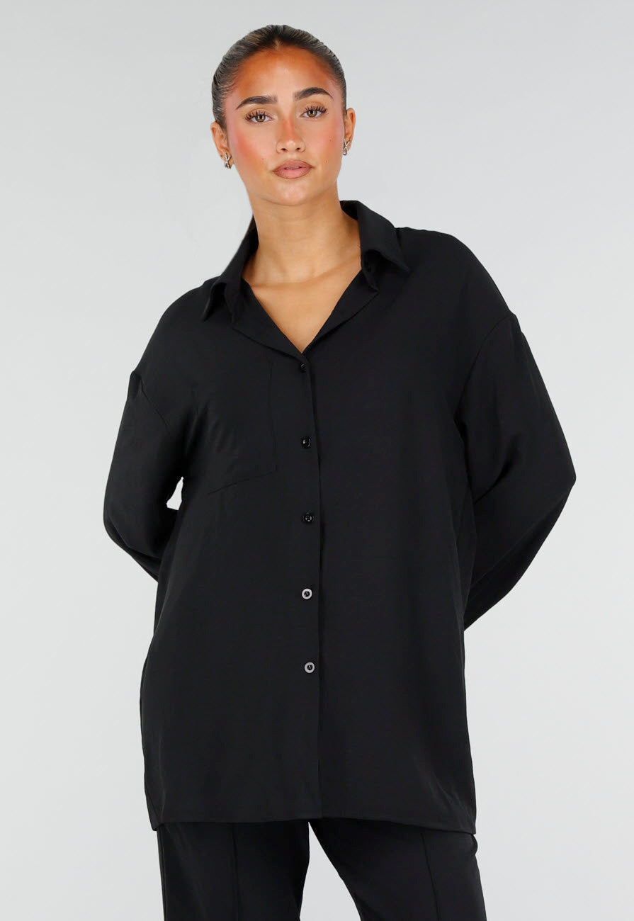 NEW290726 Zwarte Blouse met Kraag, Knoopsluiting en Lange Mouwen