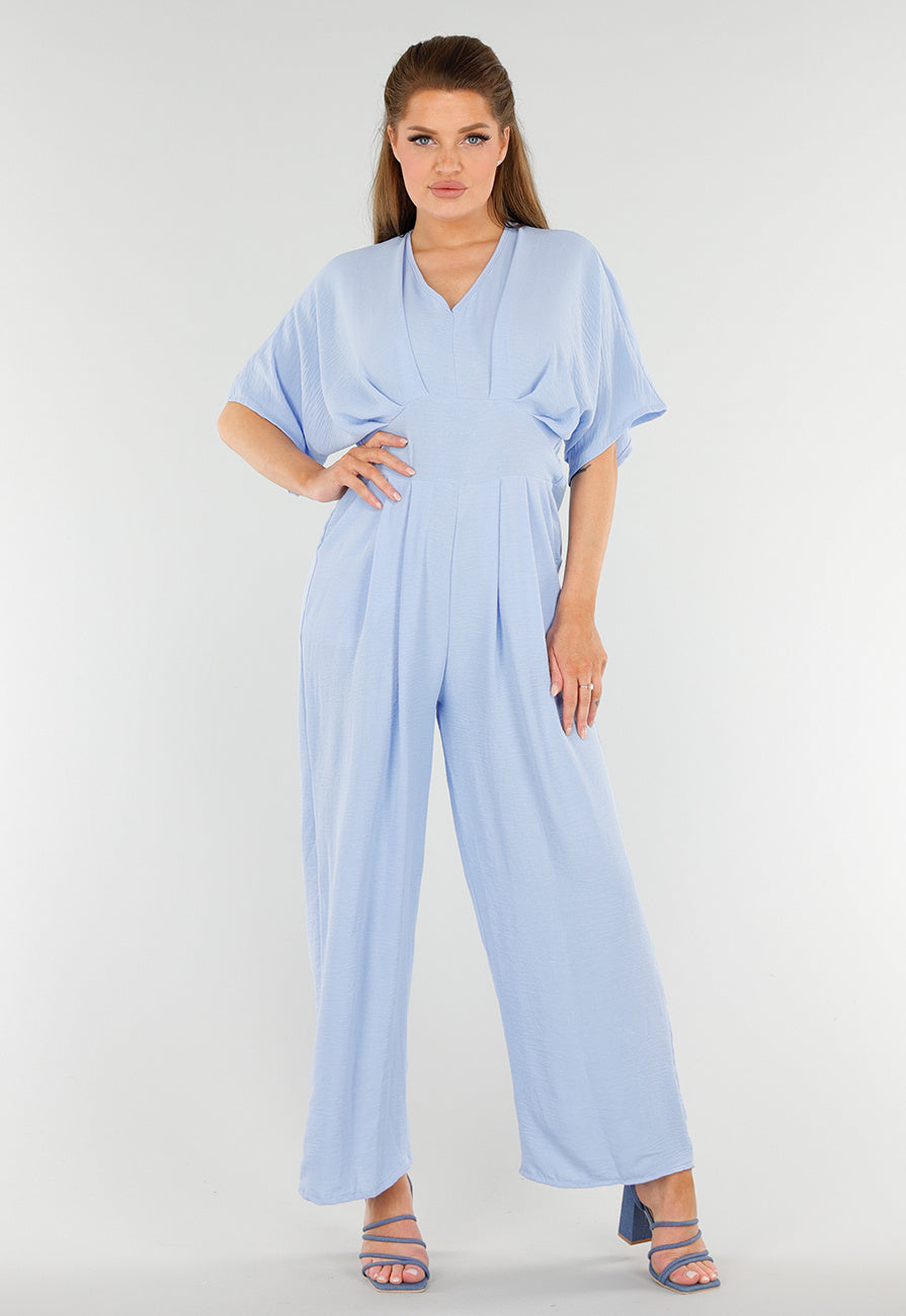 Lichtblauwe Jumpsuit met Wijde Pijpen en Lage V-Hals in Linnenlook