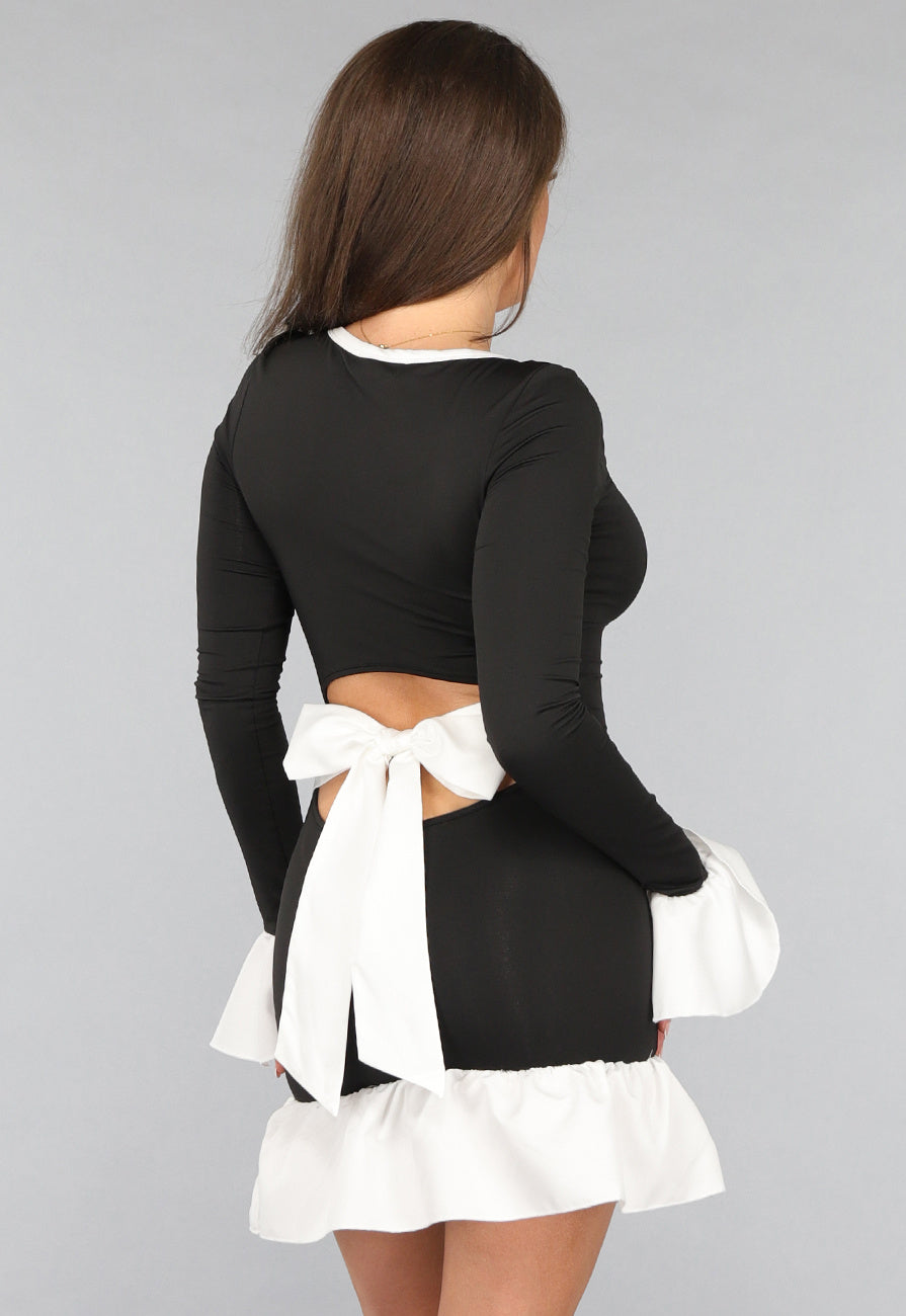 Zwarte Jurk met Witte Ruches Details en Strik