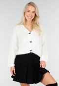 Wit Gebreid Vest met Strikknopen en Subtiele Glansdetails