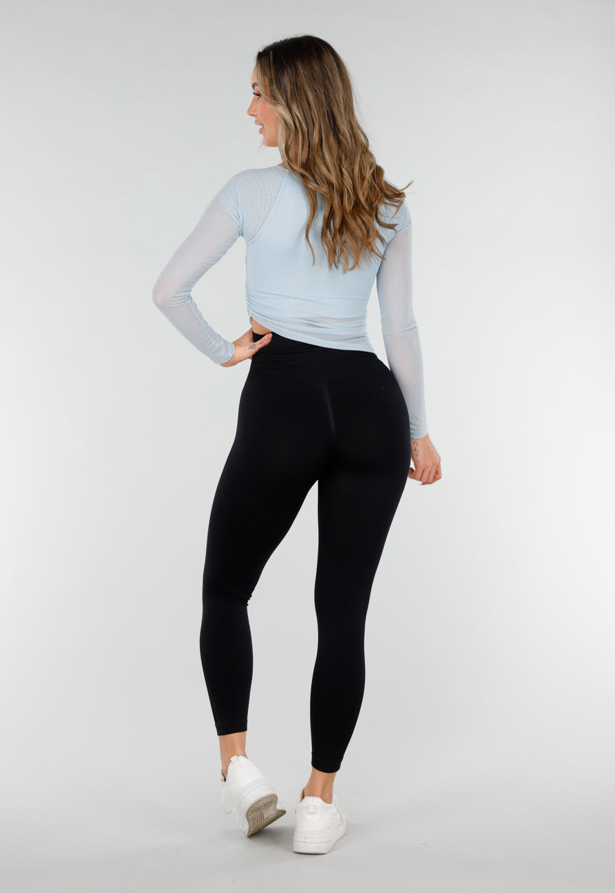 Lichtblauwe Asymmetrische Mesh Top met Lange Mouwen en Pads